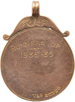 Gold_football_medal_holbrook_district_Rev