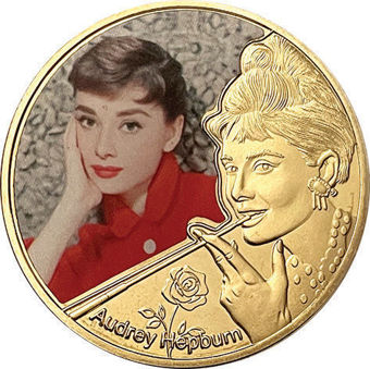 Audrey Hepburn in red resting head on hand_obv